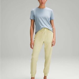 Lululemon stretch high rise joggers in finch yellow